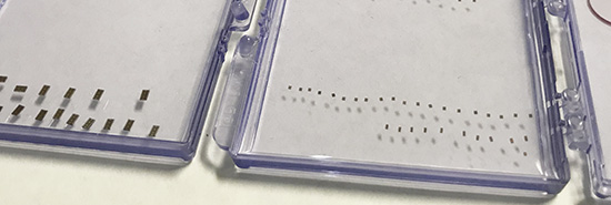 Sand-grain size sensors to monitor unconventional oil reservoirs